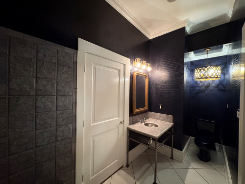 Dark bathroom with tile floors in Hammond